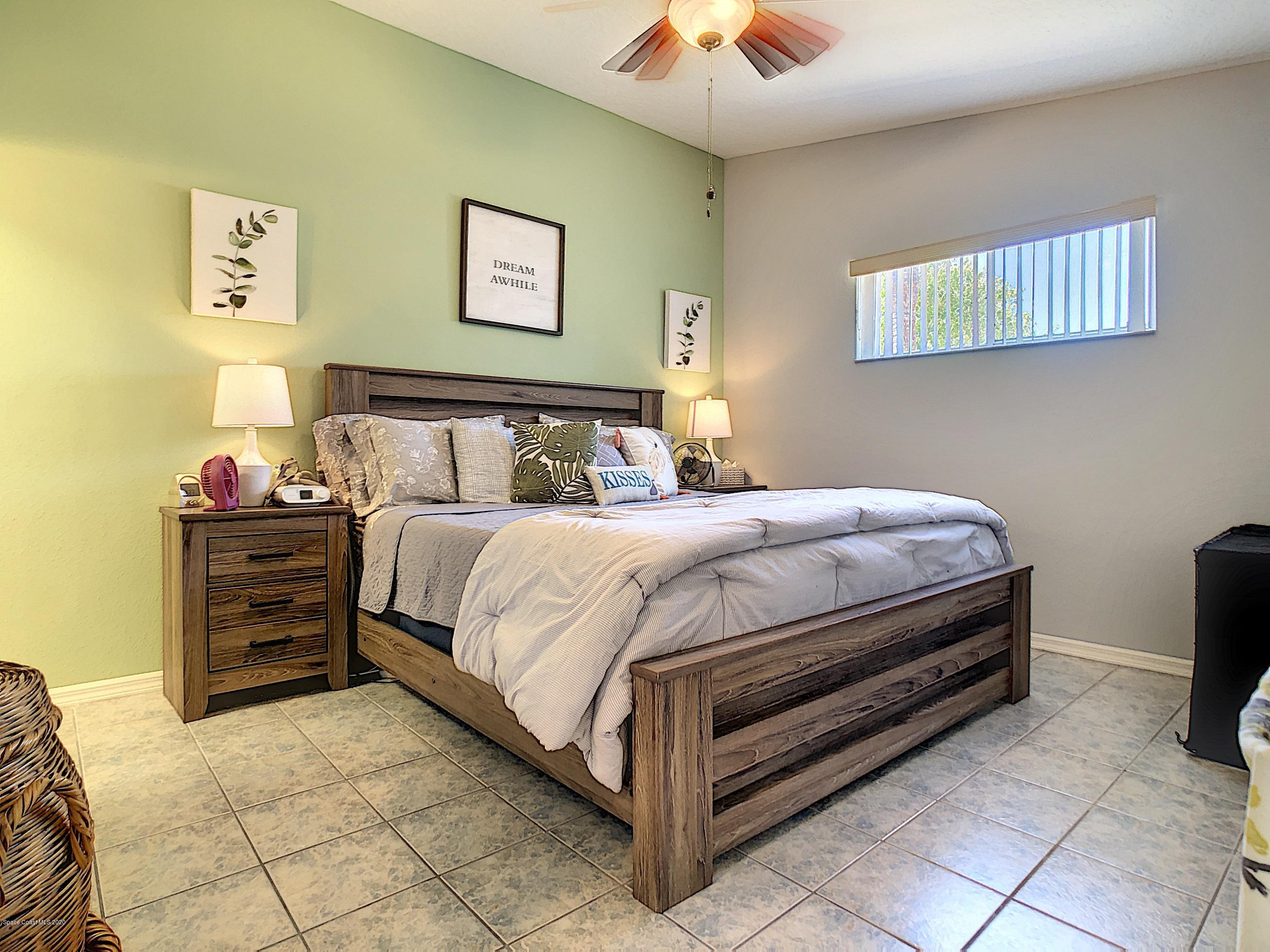 1946 Quail Ridge Court, Unit 802 Cocoa, FL 32926 - Photo 12 of 19 Master Bedroom