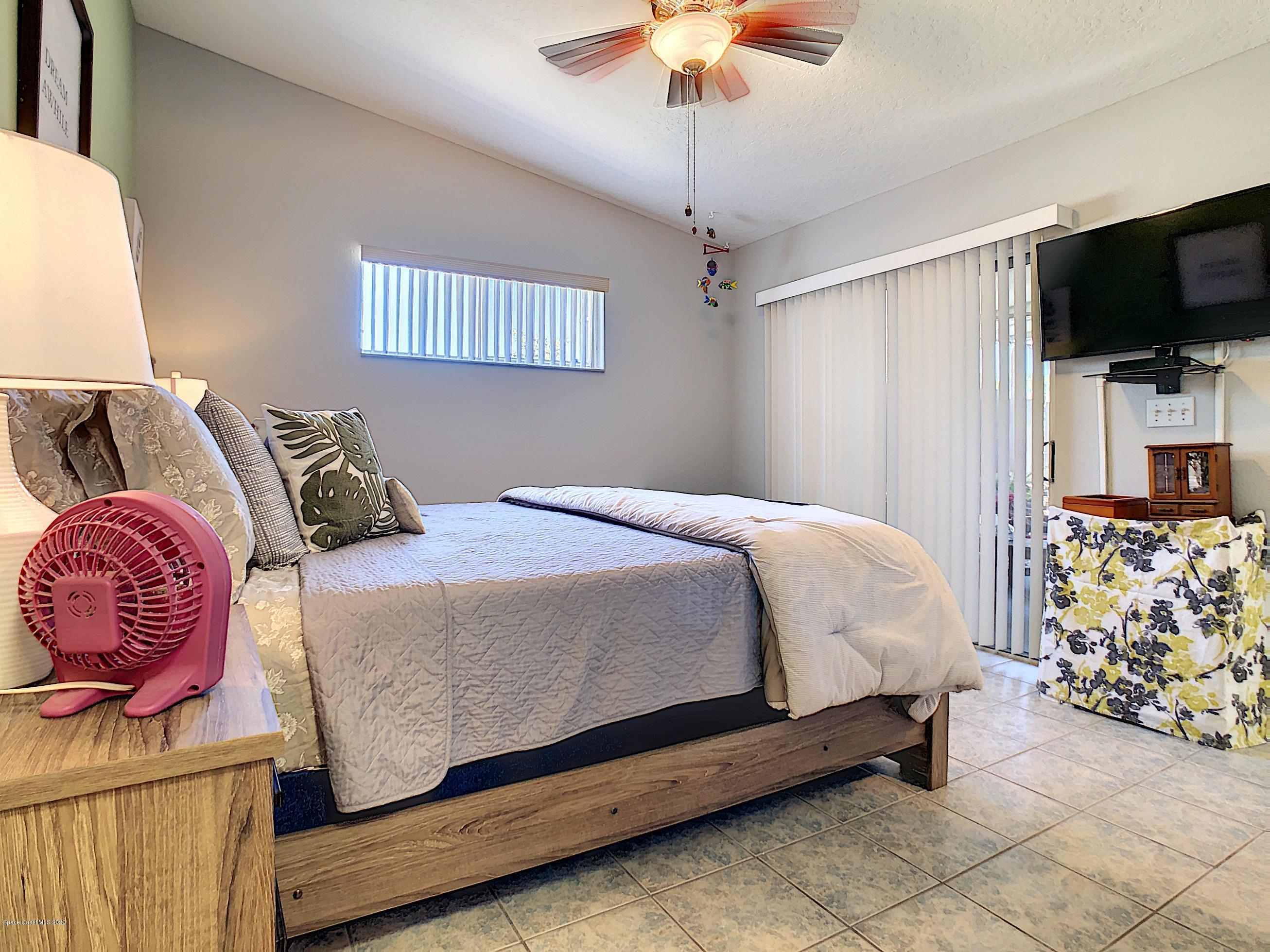 1946 Quail Ridge Court, Unit 802 Cocoa, FL 32926 - Photo 14 of 19 Master Bedroom