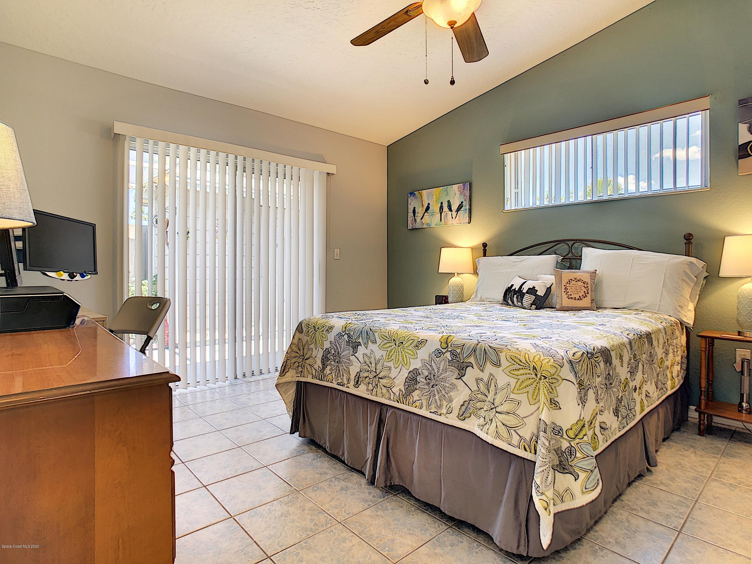 1946 Quail Ridge Court, Unit 802 Cocoa, FL 32926 - Photo 16 of 19 Guest Bedroom