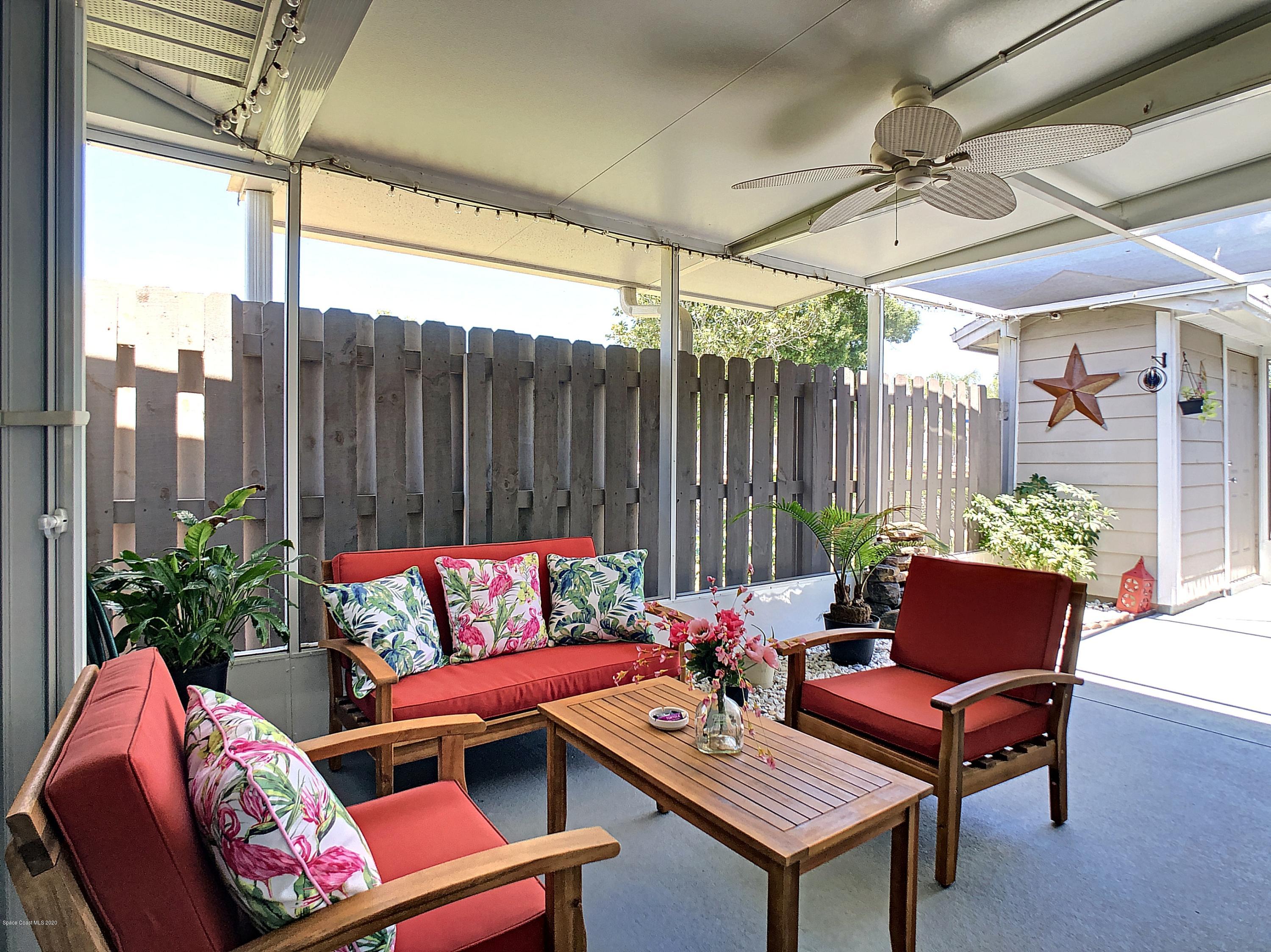 1946 Quail Ridge Court, Unit 802 Cocoa, FL 32926 - Photo 3 of 19 Screened Front Porch