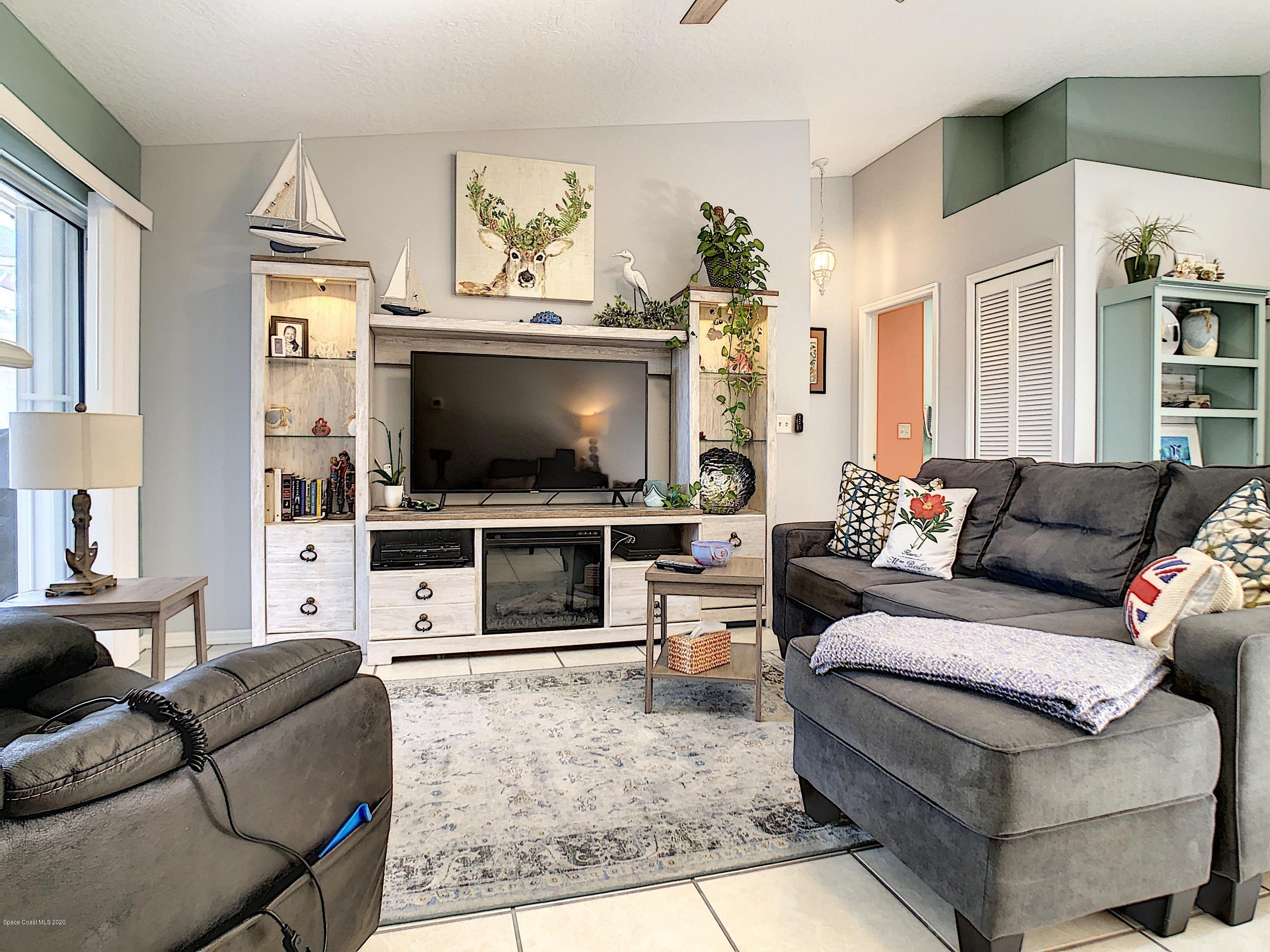 1946 Quail Ridge Court, Unit 802 Cocoa, FL 32926 - Photo 5 of 19 Living Room and Front Entry