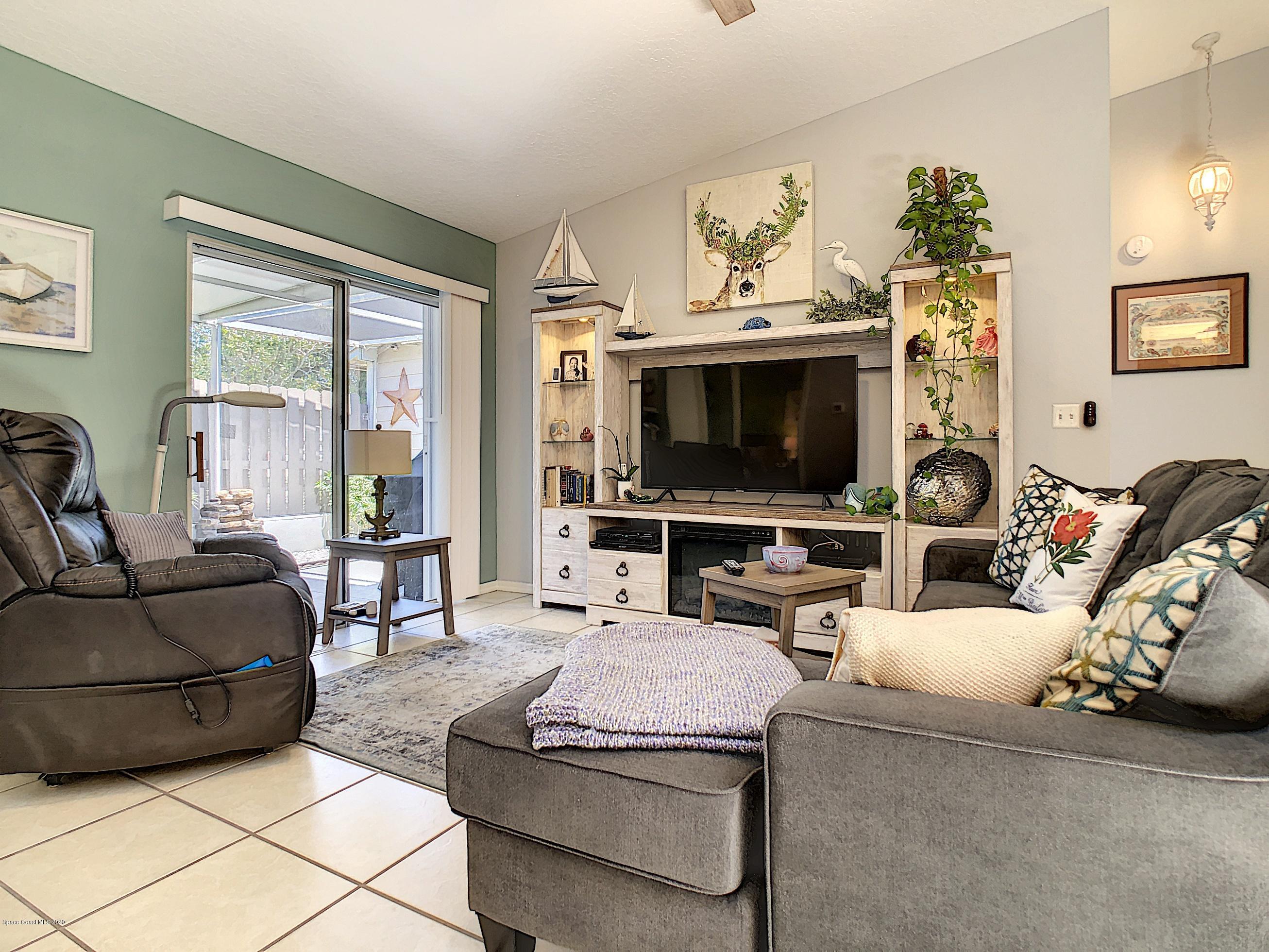1946 Quail Ridge Court, Unit 802 Cocoa, FL 32926 - Photo 6 of 19 Living Room and Front Entry