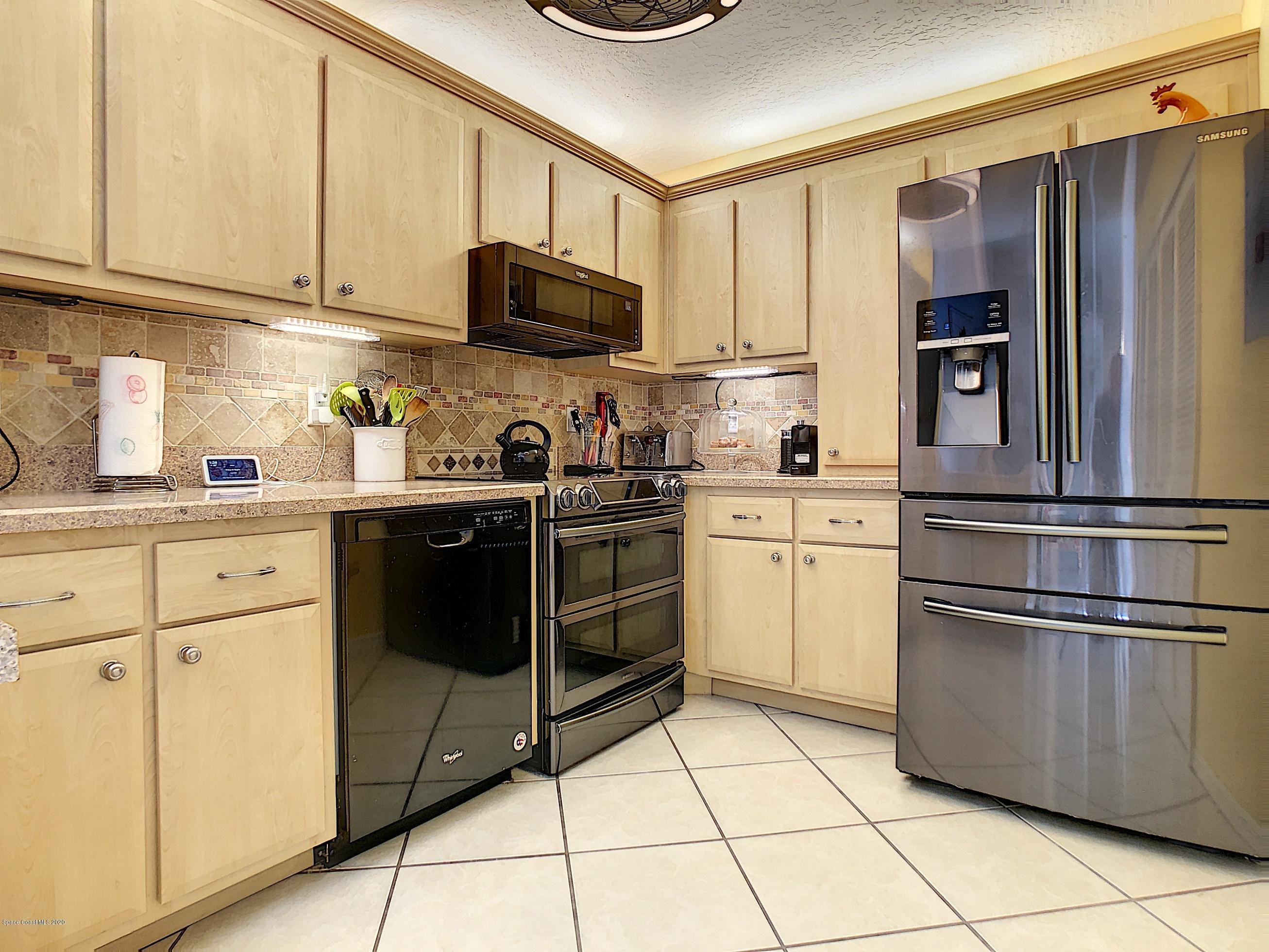 1946 Quail Ridge Court, Unit 802 Cocoa, FL 32926 - Photo 9 of 19 Kitchen