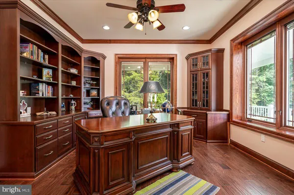 a spacious bathroom with a granite countertop sink and a mirror