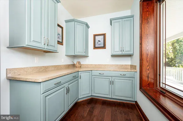 a view of an outdoor space with furniture and garden