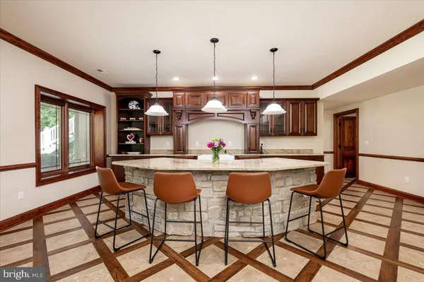 a view of a chairs and table in a patio