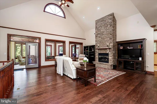 a view of a livingroom with furniture and a table
