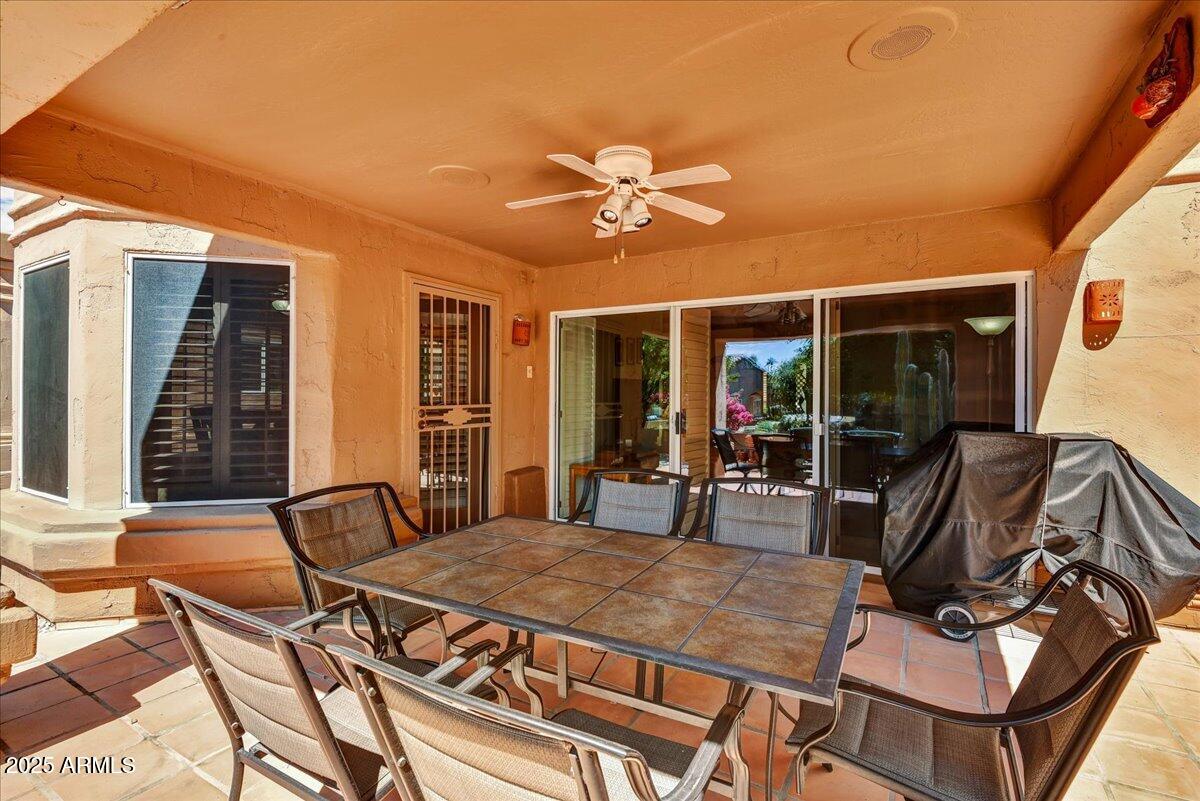 9013 West Marco Polo Road Peoria, AZ 85382 - Photo 17 of 30 a view of a dining room with furniture window and outside view