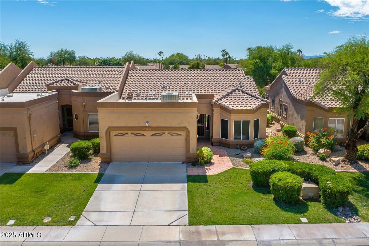 9013 West Marco Polo Road Peoria, AZ 85382 - Photo 20 of 30 a aerial view of a house with garden