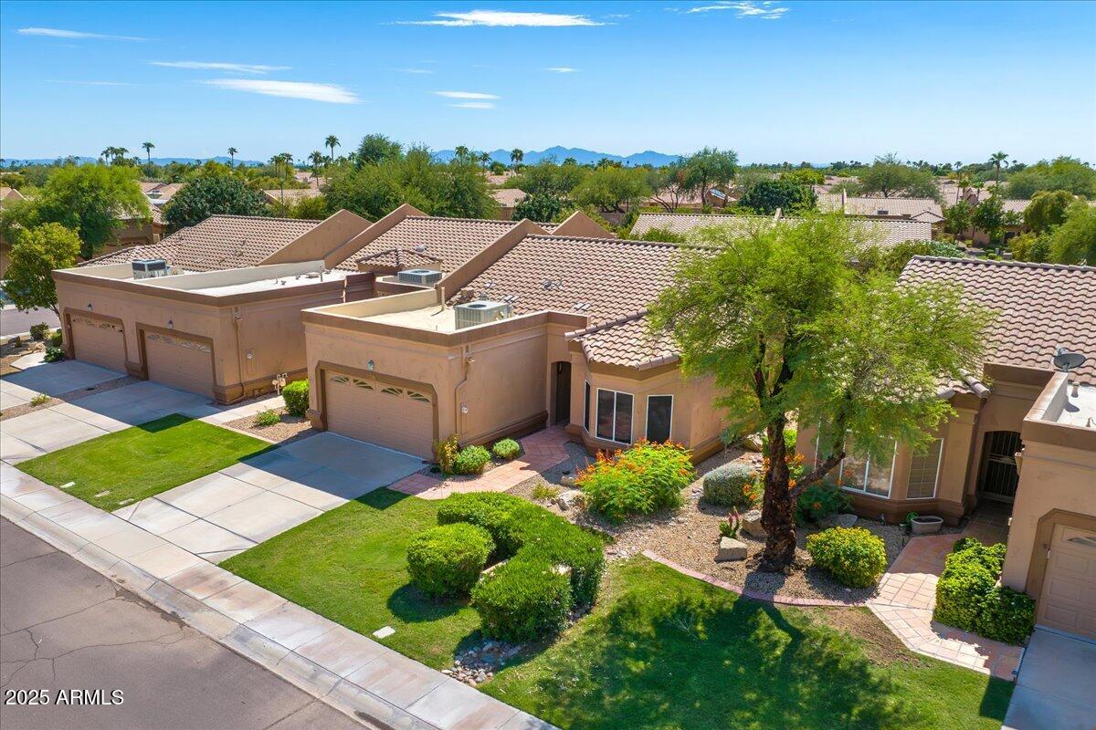 9013 West Marco Polo Road Peoria, AZ 85382 - Photo 24 of 30 an aerial view of a house with a garden