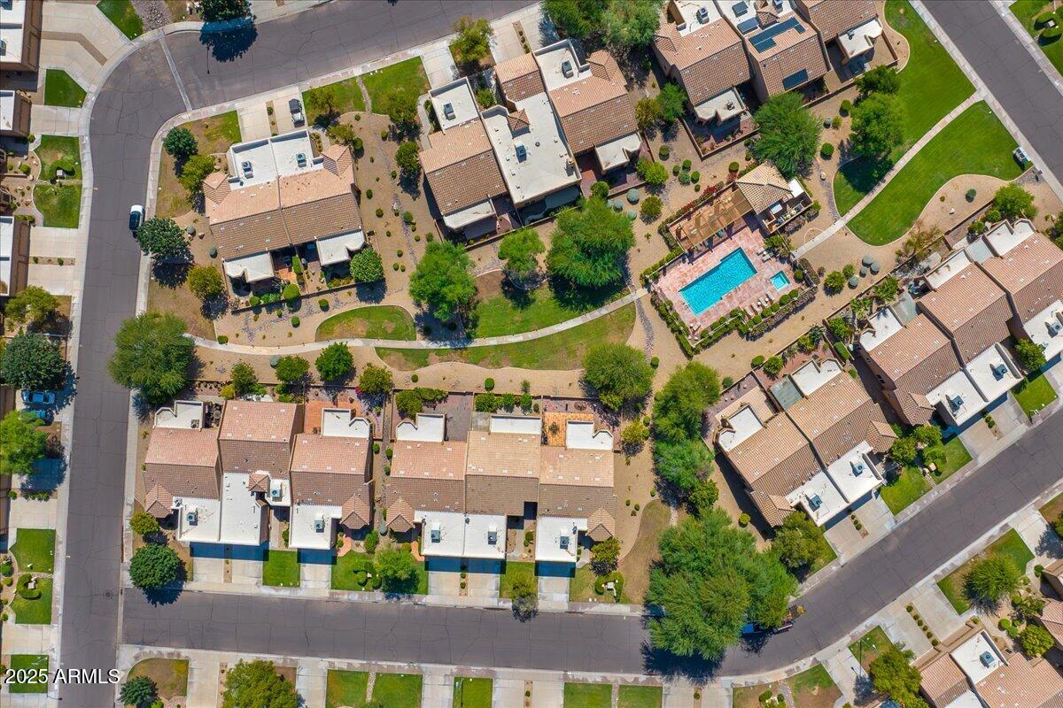 9013 West Marco Polo Road Peoria, AZ 85382 - Photo 4 of 30 an aerial view of multiple houses with yard