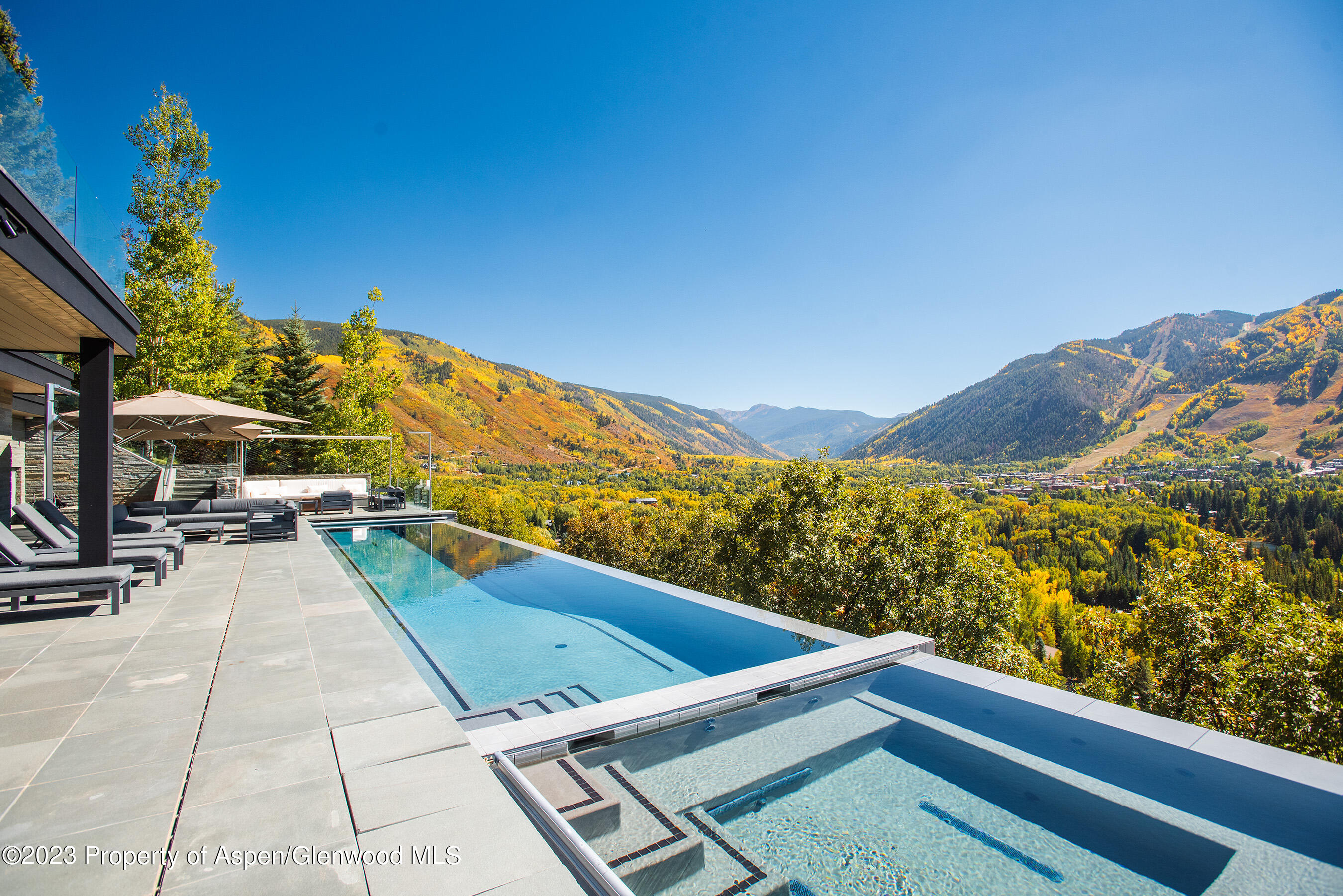257 Ridge Road Aspen, CO 81612 - Photo 44 of 47 a view of swimming pool with a lounge chair