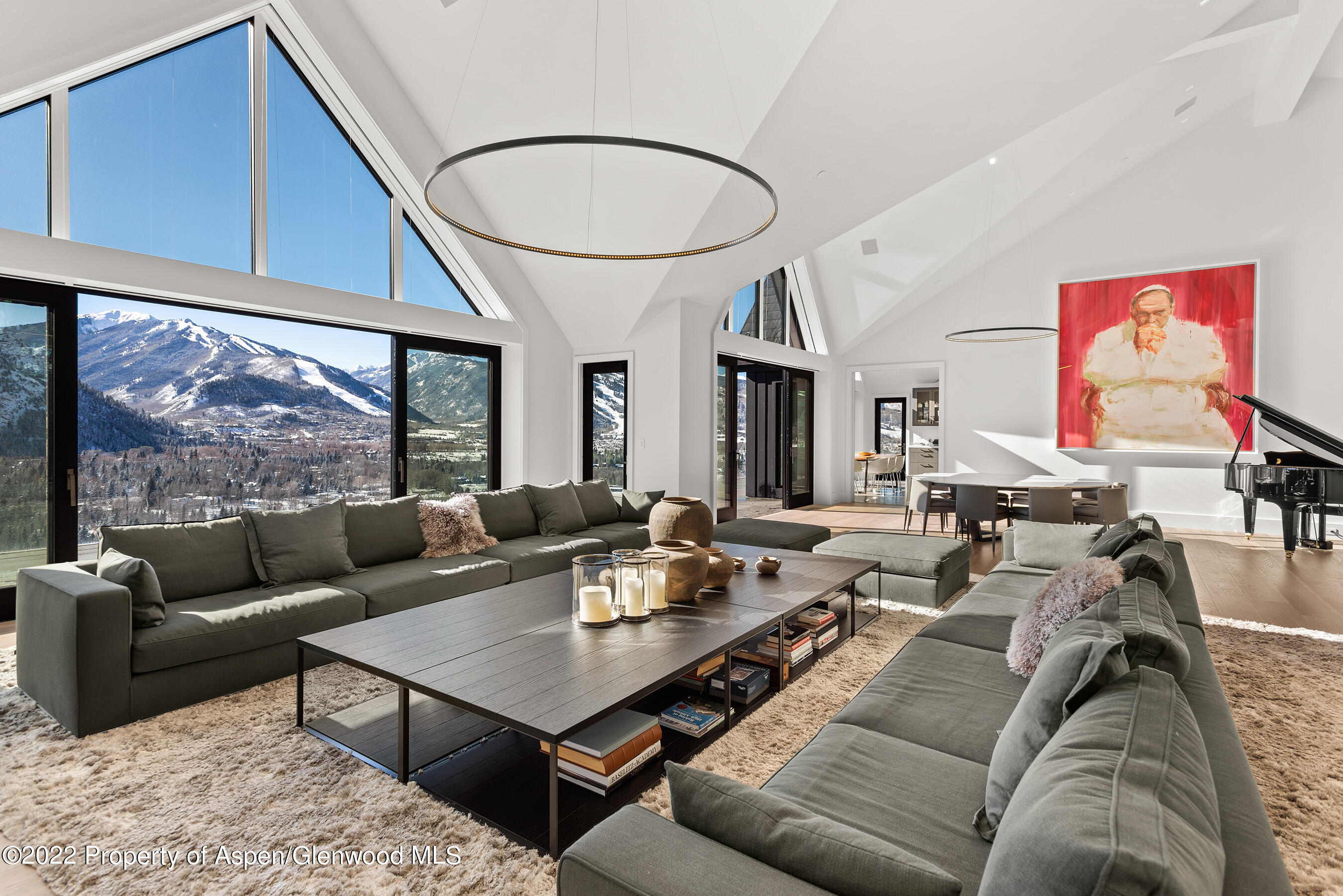 257 Ridge Road Aspen, CO 81612 - Photo 9 of 47 a living room with furniture kitchen view and a large window