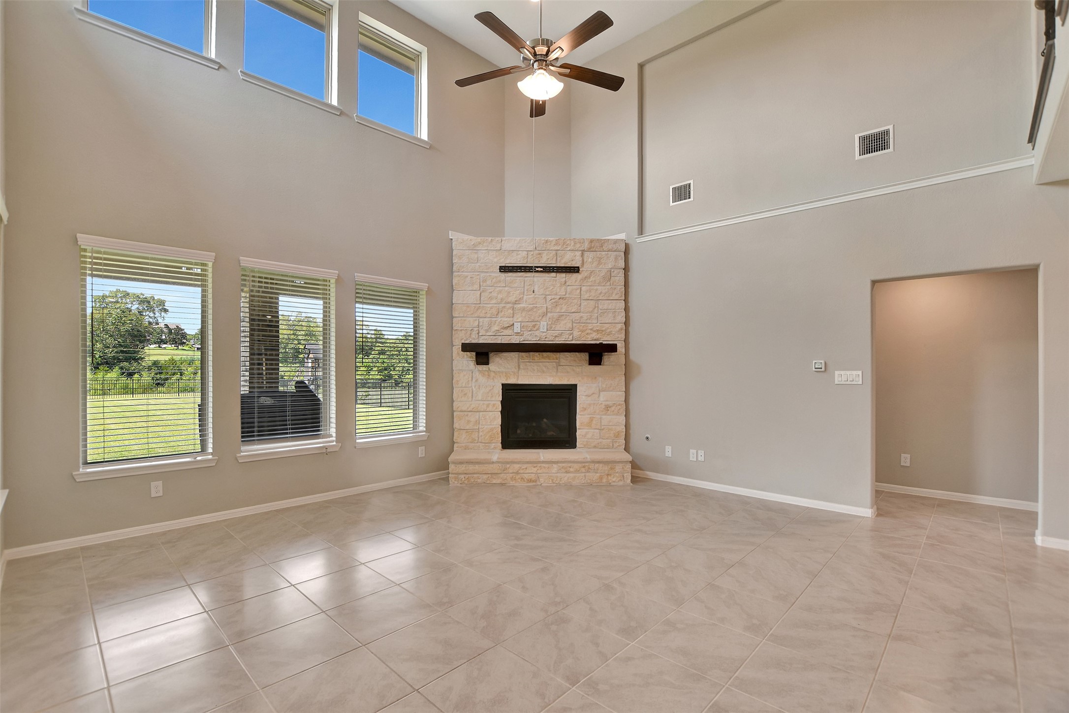 246 Peninsula Point Drive Montgomery, TX 77356 - Photo 16 of 47 Living area looks out to the backyard covered patio