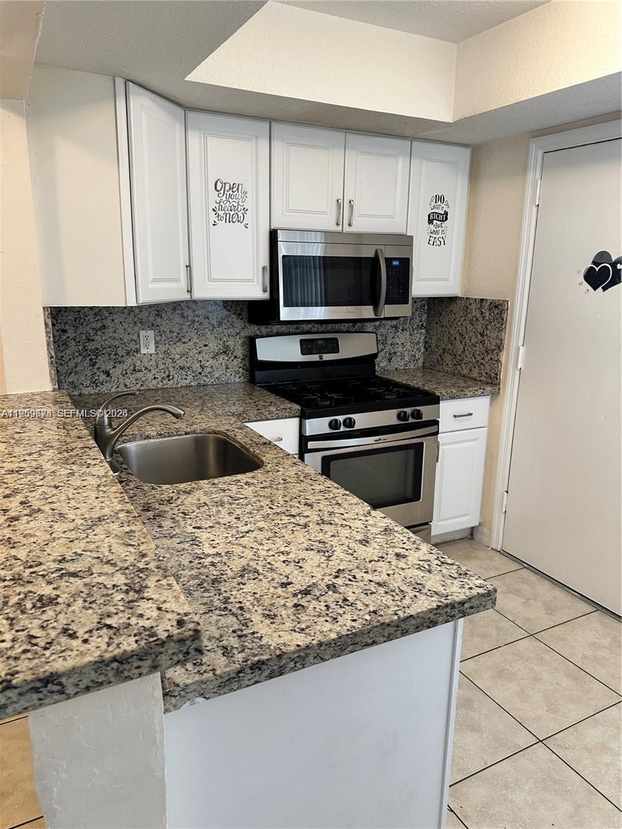 7713 Southwest 88th Street, Unit A310 Miami, FL 33156 - Photo 3 of 15