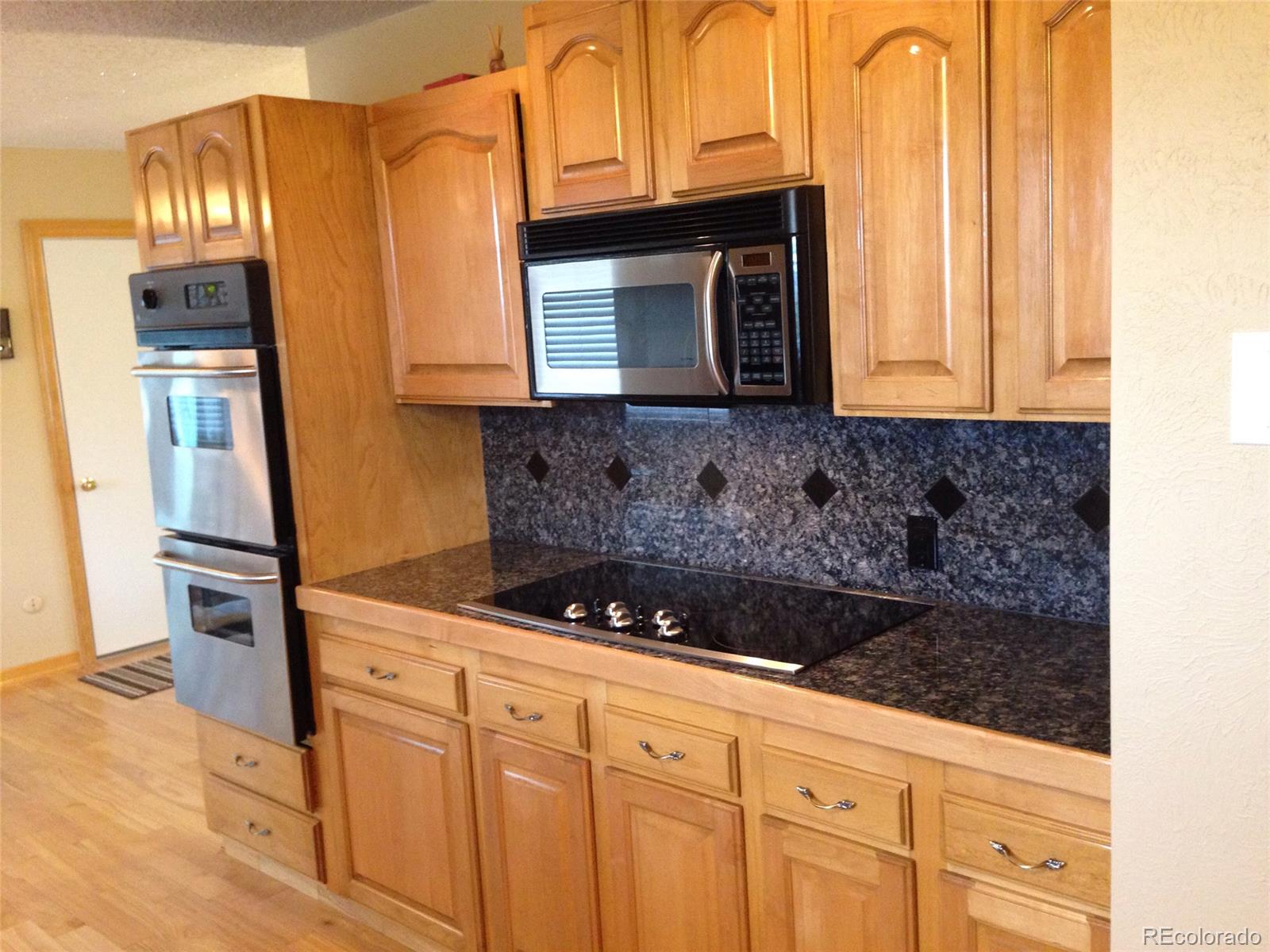 212 North Dutch Valley Road Bennett, CO 80102 - Photo 7 of 26 Gallery Image 7