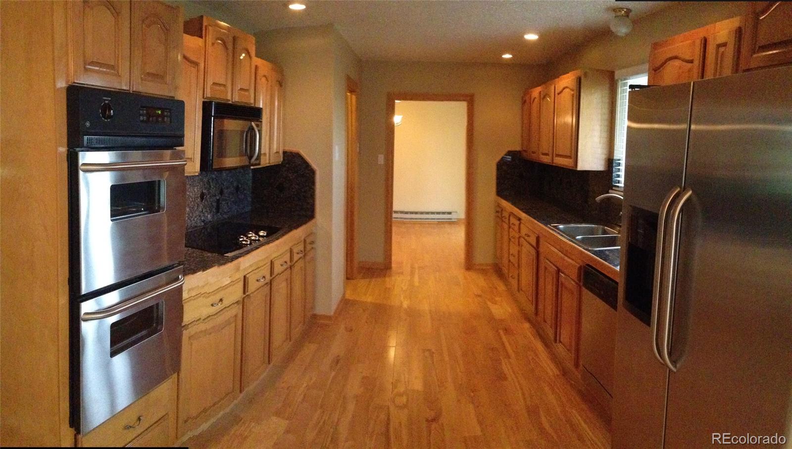 212 North Dutch Valley Road Bennett, CO 80102 - Photo 8 of 26 Gallery Image 8