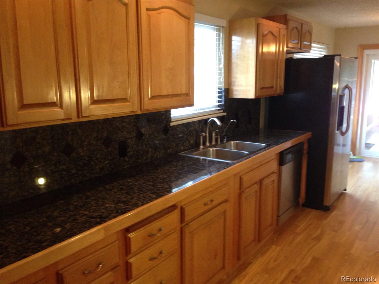 212 North Dutch Valley Road Bennett, CO 80102 - Photo 9 of 26 Gallery Image 9