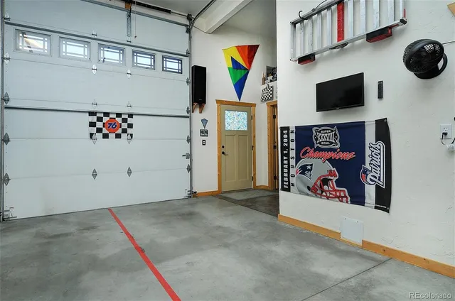 a view of a entryway with flat screen tv