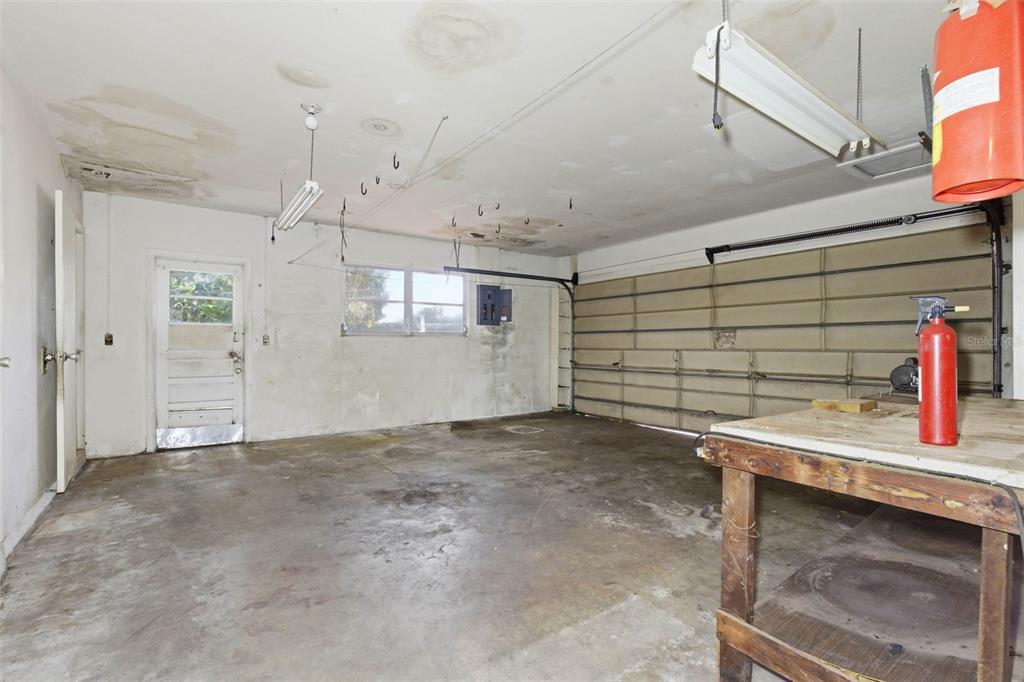 2310 Harrison Drive Dunedin, FL 34698 - Photo 18 of 42 a view of a garage