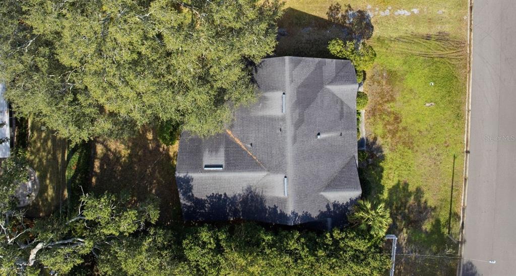 2310 Harrison Drive Dunedin, FL 34698 - Photo 31 of 42 an aerial view of a house