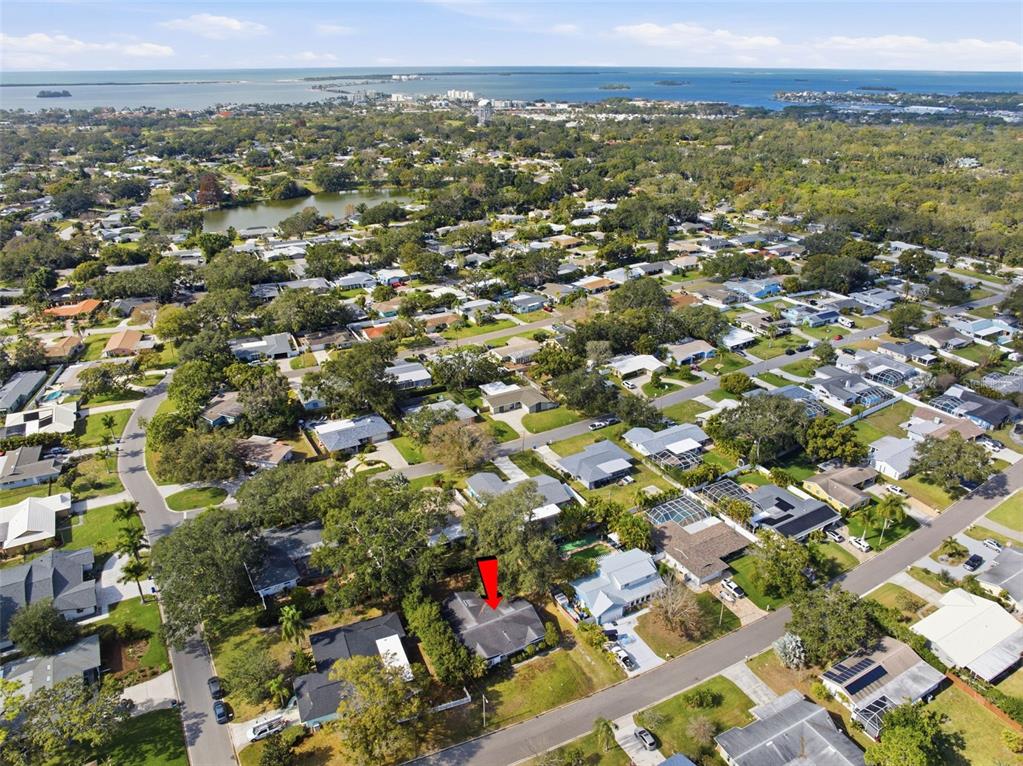 2310 Harrison Drive Dunedin, FL 34698 - Photo 33 of 42 an aerial view of residential houses with outdoor space