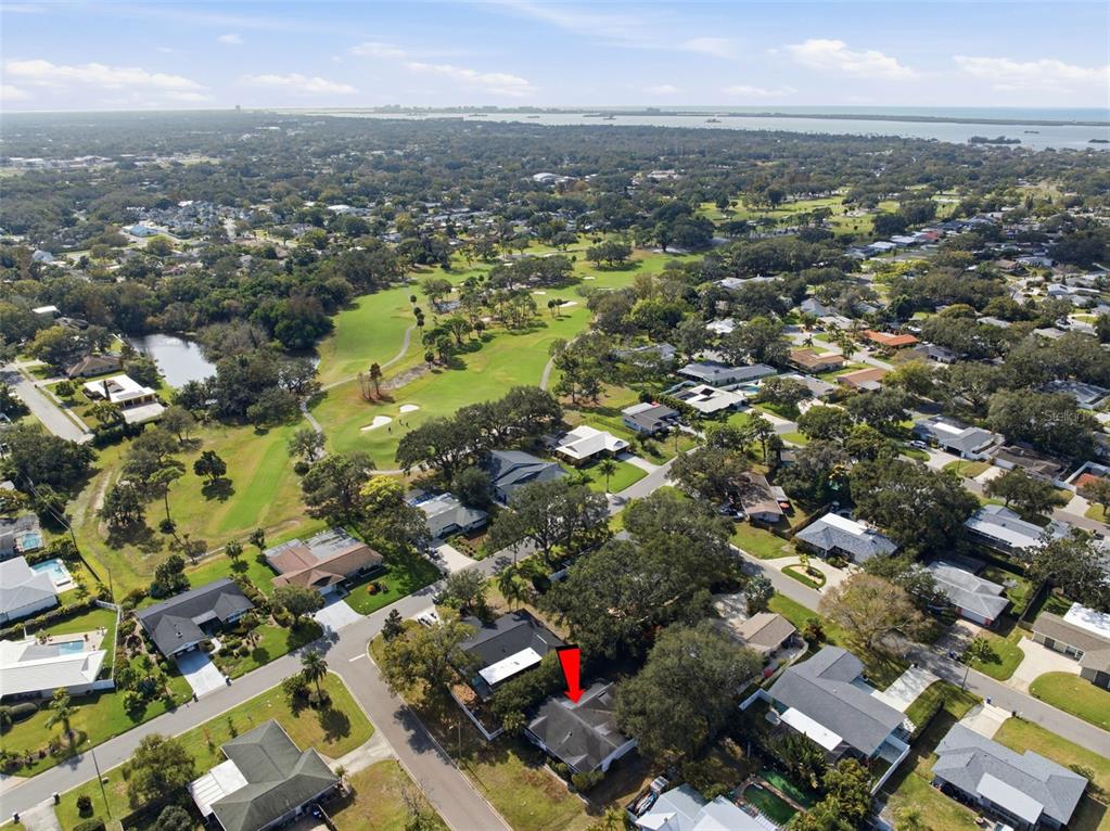 2310 Harrison Drive Dunedin, FL 34698 - Photo 35 of 42 an aerial view of multiple house