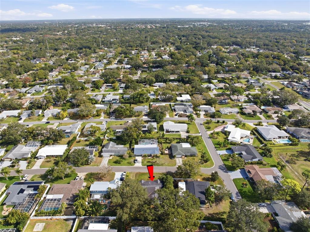 2310 Harrison Drive Dunedin, FL 34698 - Photo 37 of 42 an aerial view of residential houses with city view
