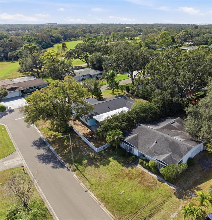 2310 Harrison Drive Dunedin, FL 34698 - Photo 40 of 42 an aerial view of residential houses with outdoor space