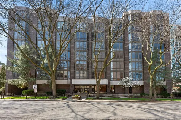 a front view of a building with street view