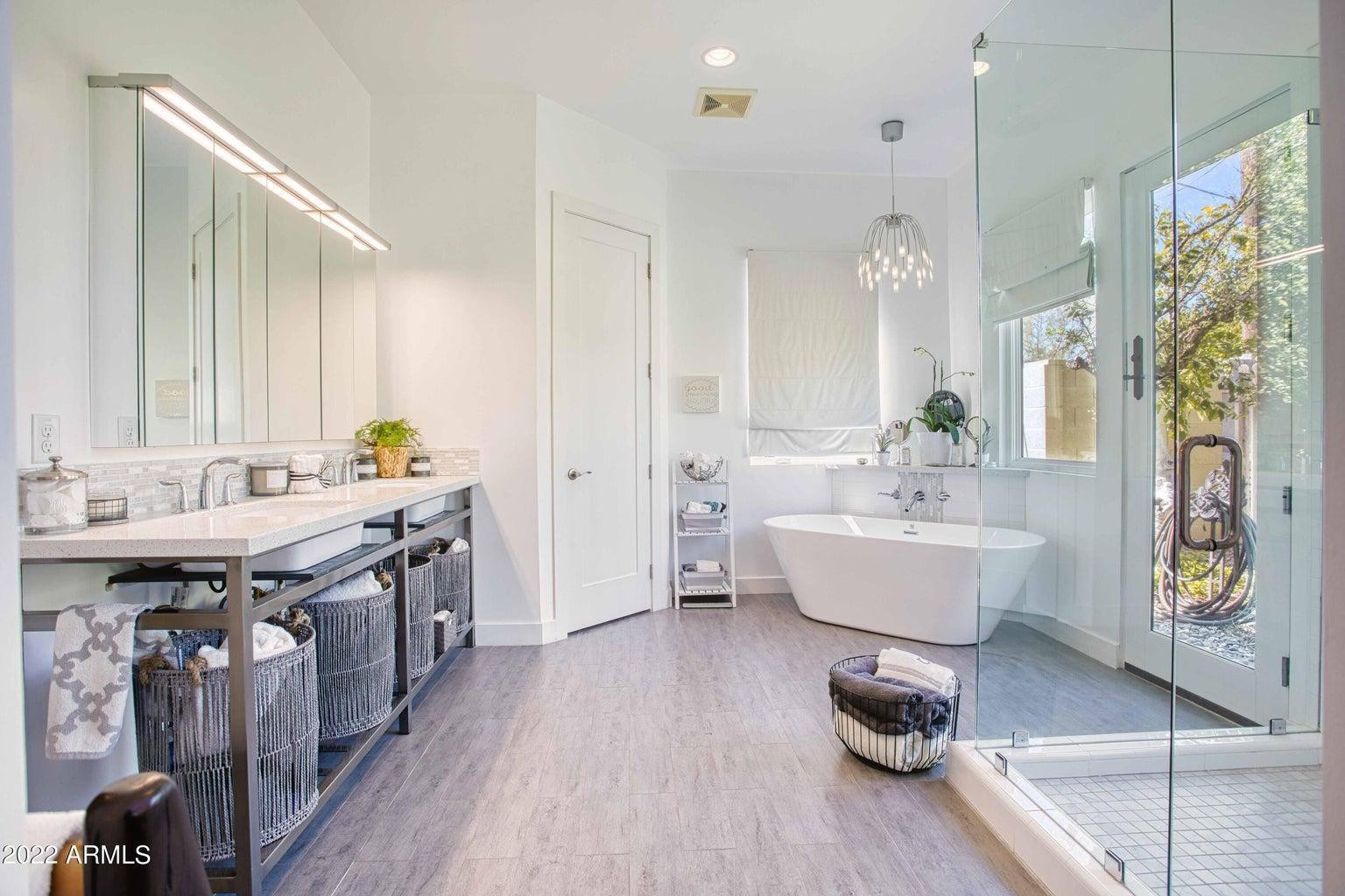 3230 East Colter Street Phoenix, AZ 85018 - Photo 16 of 28 a spacious bathroom with a sink a toilet and shower