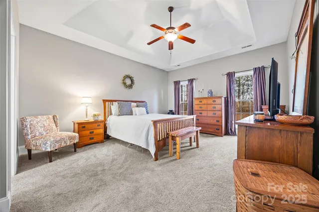 a bed room with a bed and a couch