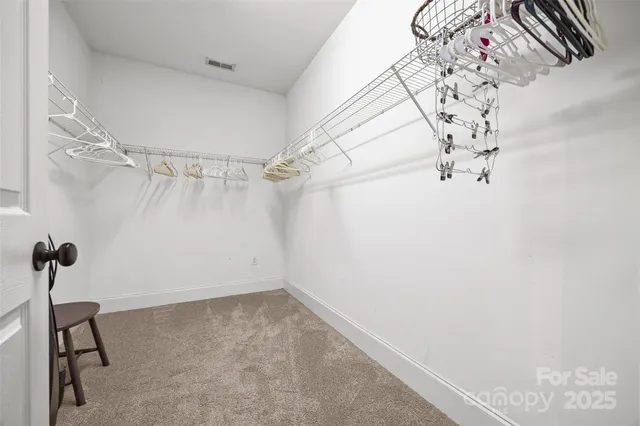 a view of a room with rack on the wall