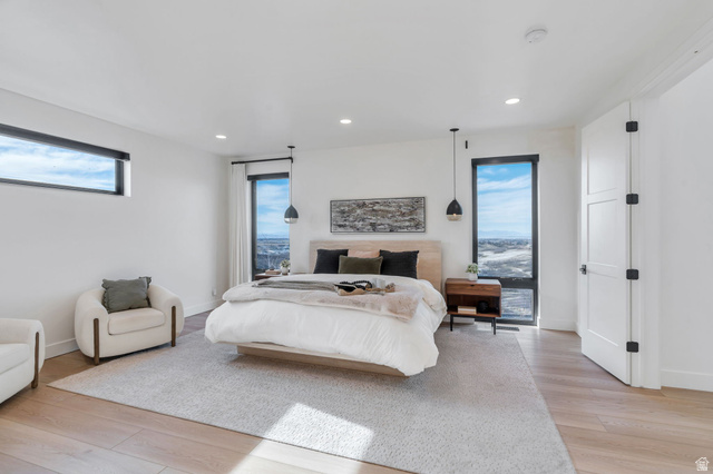 3918 South Mapleton Ests Drive Mapleton, UT 84664 - Photo 10 of 103 Bedroom featuring light wood-type flooring, recessed lighting, and multiple windows