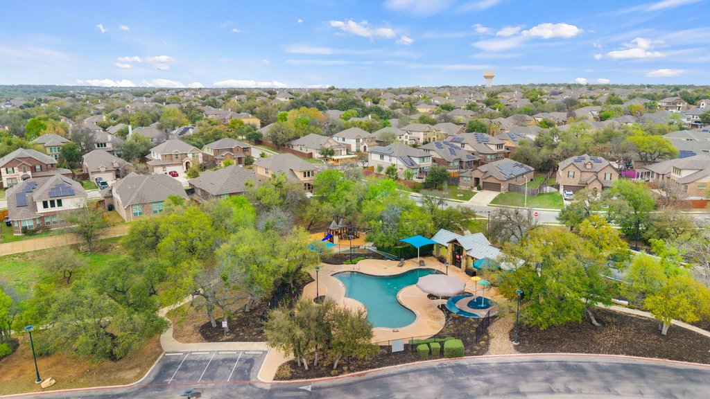 4229 Borho Ranch Street Leander, TX 78641 - Photo 33 of 40 Aerial perspective of suburban area featuring a pool