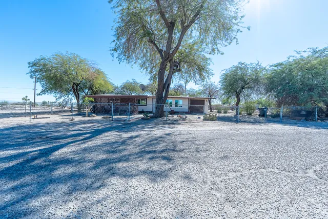 a view of a chairs and tables in the patio