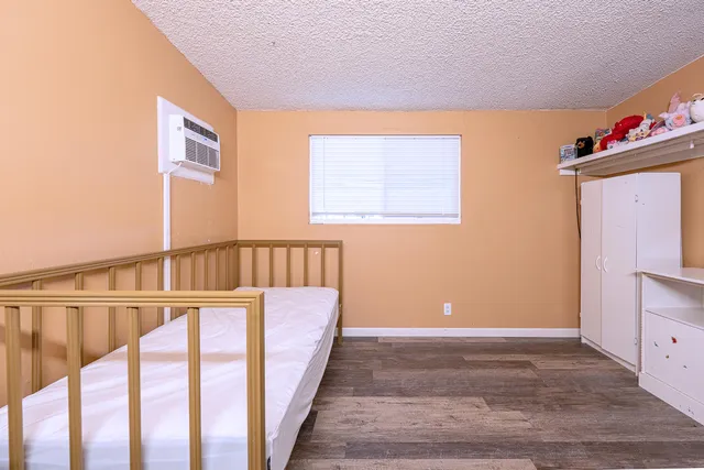 a view of a hallway with seating area