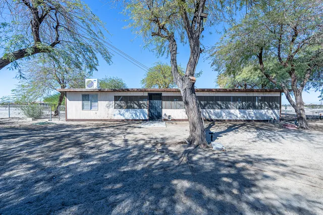 a view of balcony with furniture