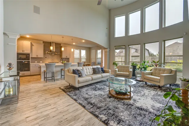 a spacious bedroom with a bed and a window