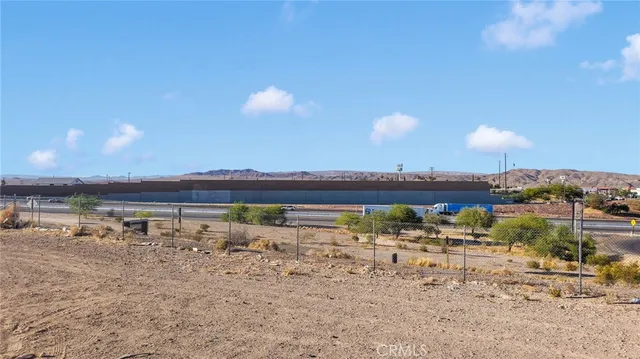 a view of a lake with a beach