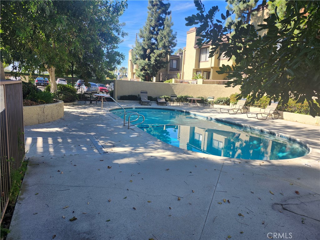 849 East Victoria Street, Unit 209 Carson, CA 90746 - Photo 5 of 5 a view of a house with a yard