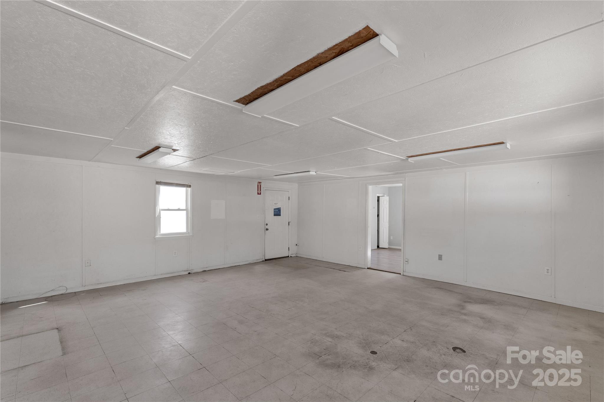 4336 McAllister Road Catawba, SC 29704 - Photo 44 of 47 an empty room with a empty space and windows