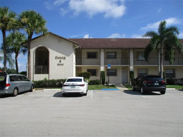 a car parked in front of a house