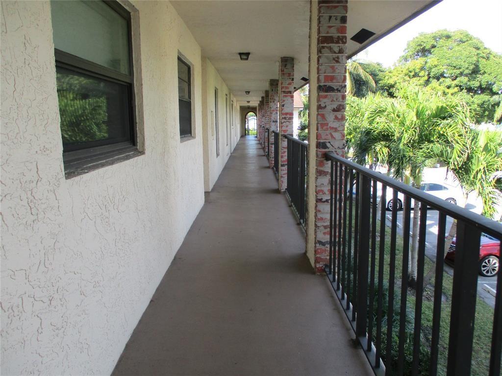 23442 Southwest 57th Avenue, Unit 406 Boca Raton, FL 33428 - Photo 25 of 25 a view of a balcony