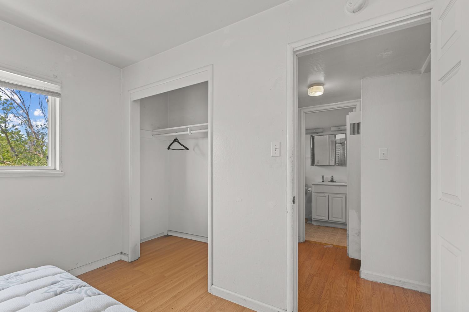 2123 15th Avenue Sacramento, CA 95822 - Photo 11 of 35 an empty room with closet and a bathroom