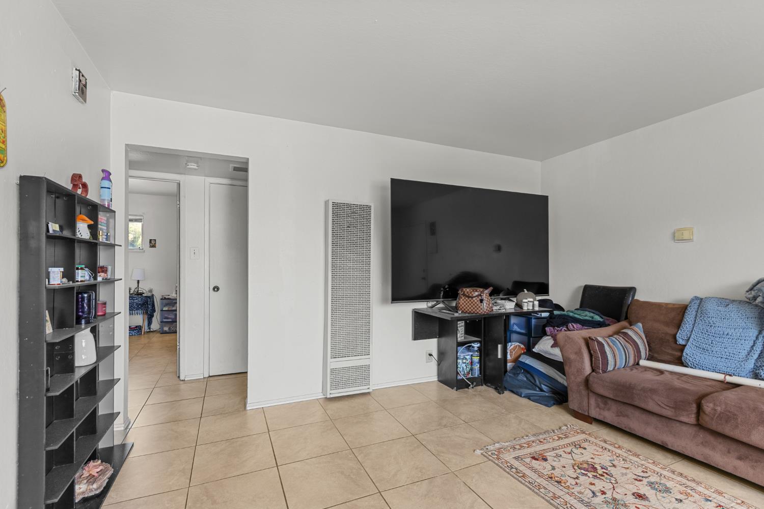 2123 15th Avenue Sacramento, CA 95822 - Photo 19 of 35 a view of a livingroom with furniture and lounge chair