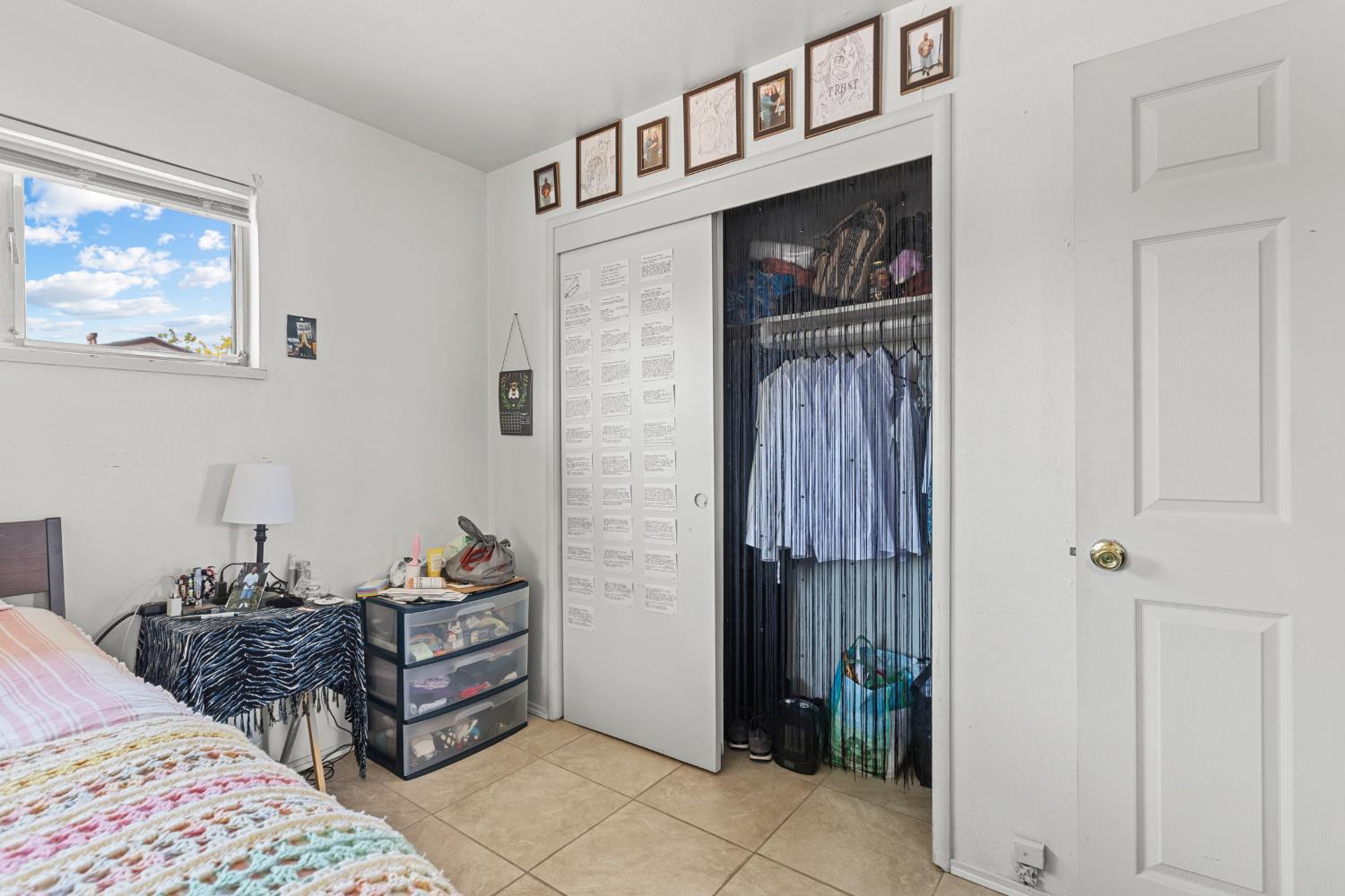 2123 15th Avenue Sacramento, CA 95822 - Photo 22 of 35 a bedroom with a bed and a window