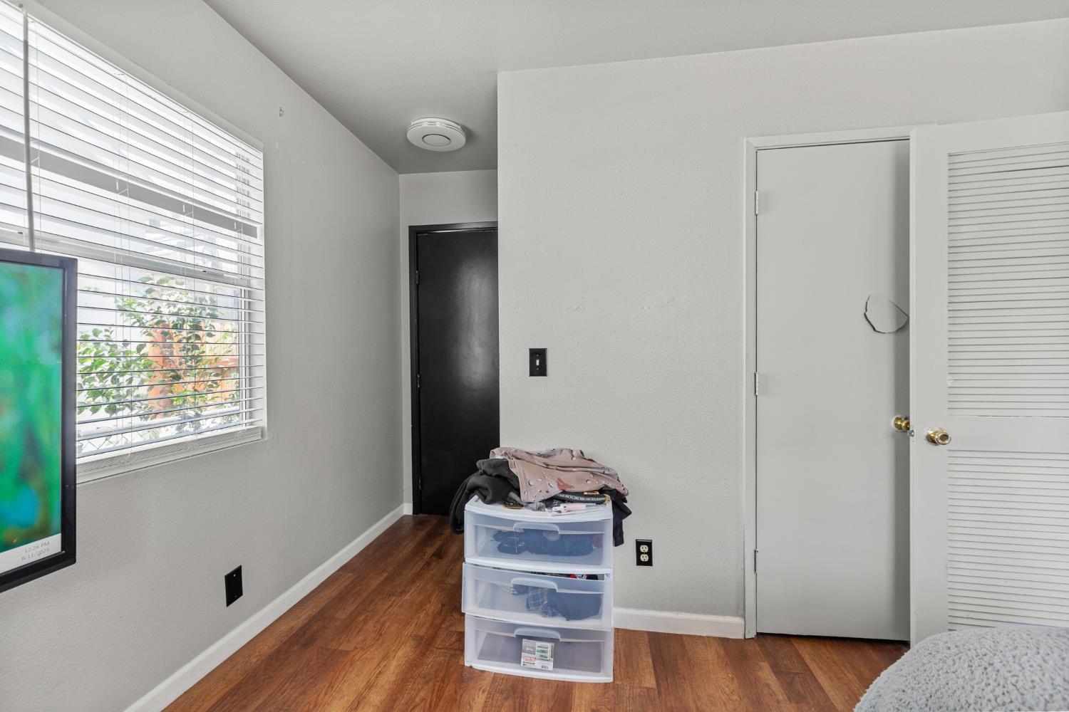 2123 15th Avenue Sacramento, CA 95822 - Photo 30 of 35 a view of an entryway with wooden floor