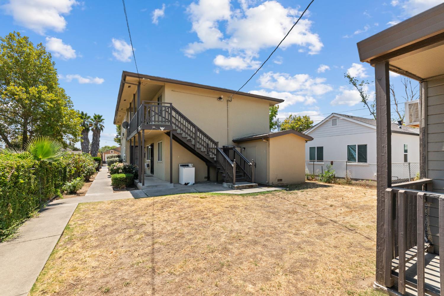 2123 15th Avenue Sacramento, CA 95822 - Photo 4 of 35 a view of a house with a snow in the yard
