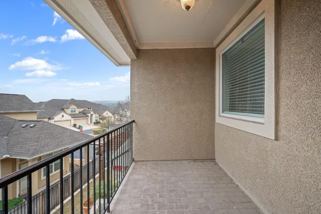 a view of a balcony with an outdoor space